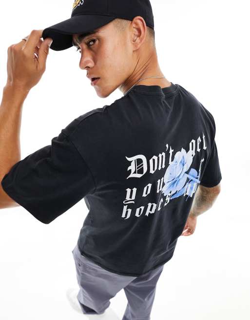 ADPT - Super oversized T-shirt met rozenprint op de achterkant en detail aan de hals in zwart met wassing