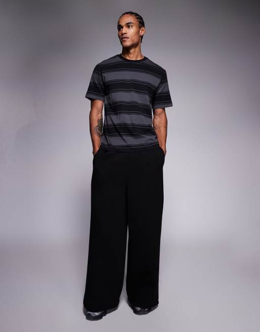 ADPT - T-shirt oversize nera a righe, 2 di 5