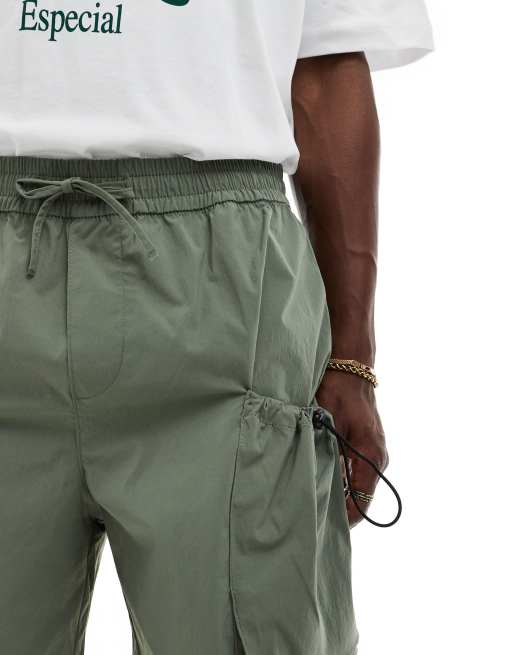 ADPT technical cargo short in green, 3 of 5