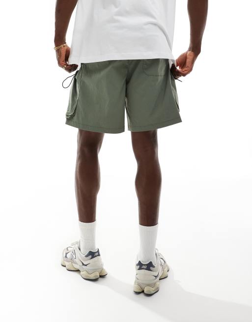ADPT technical cargo short in green, 4 of 5