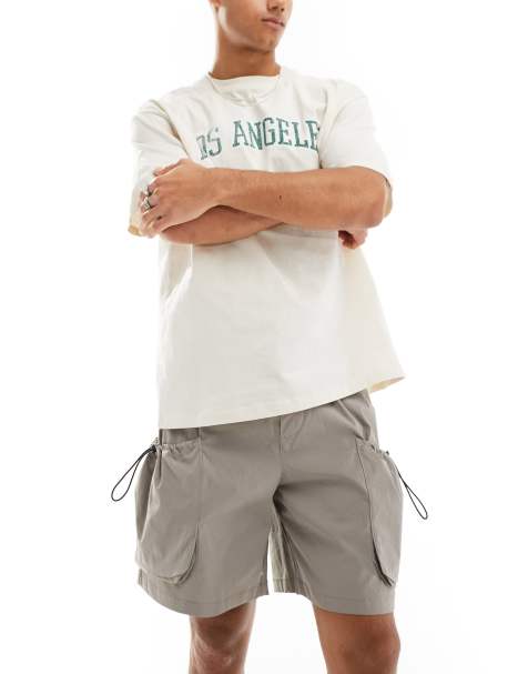 ADPT technical cargo shorts in beige - view 1