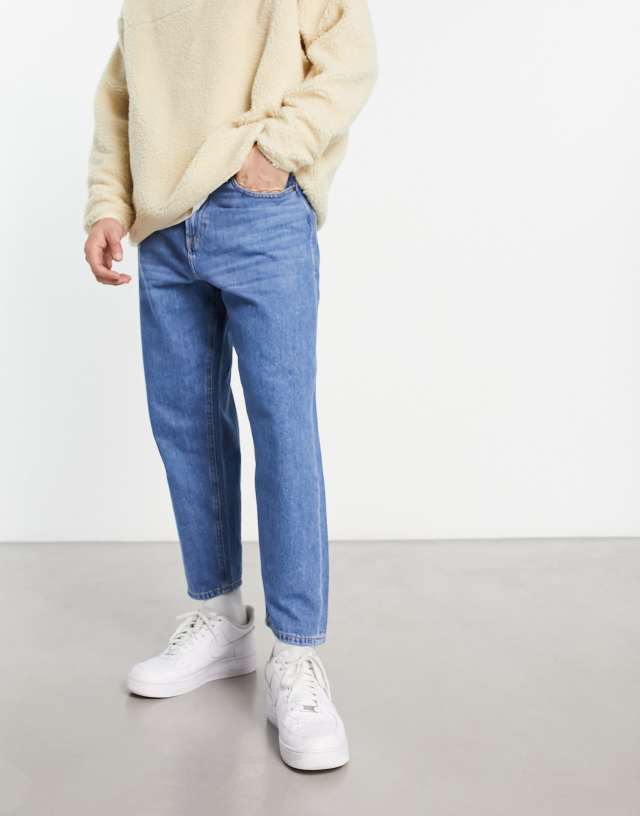 ADPT wide fit cropped jeans in mid blue wash