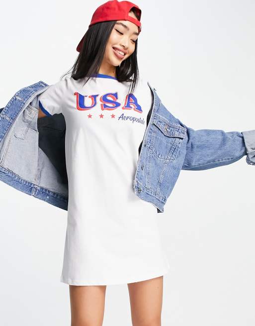 Aeropostale – Biała rozkloszowana sukienka T-shirtowa z logo USA