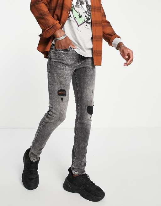 Aeropostale skinny jeans with rips in grey