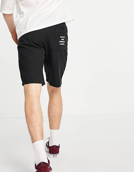  Afends Late Start jersey shorts in black with patch placement print 