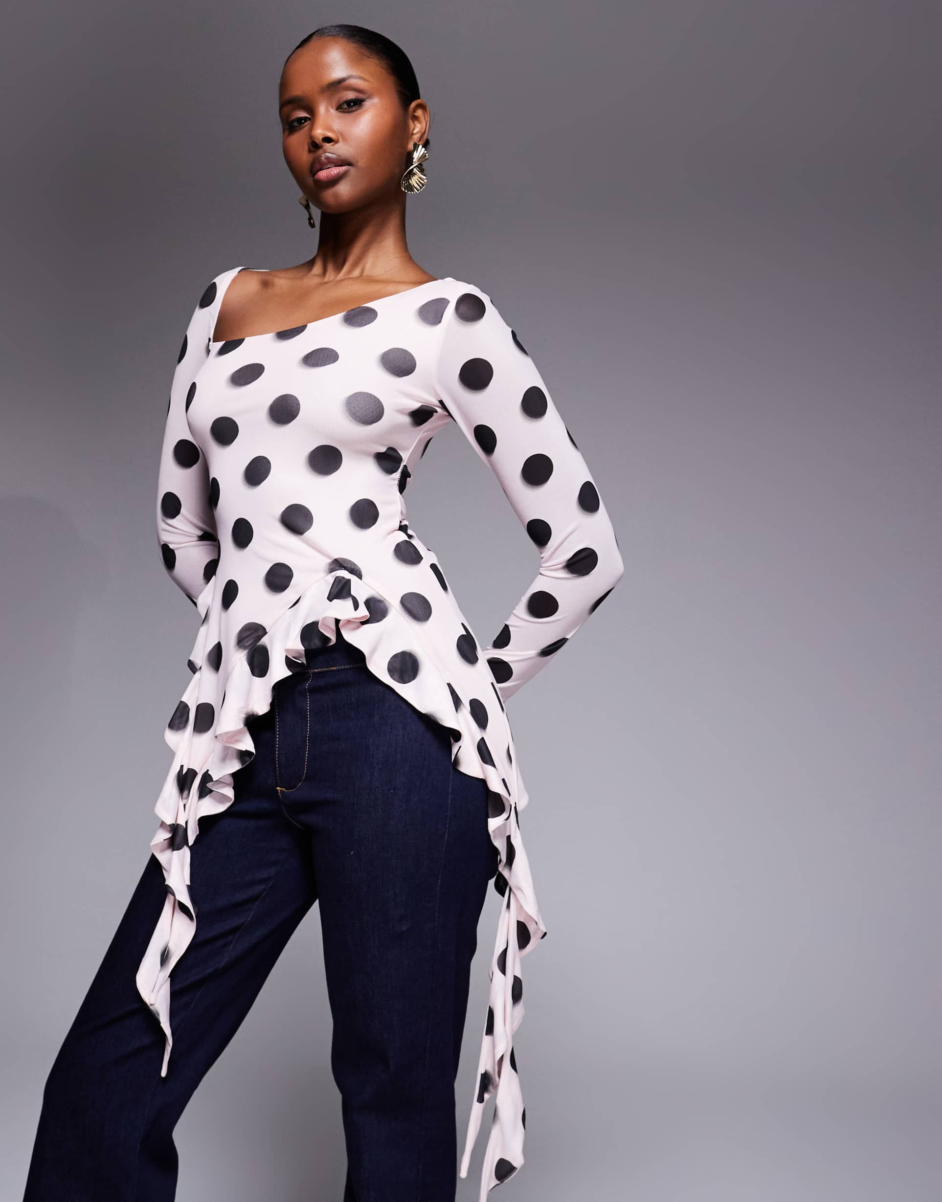 afrm doris asymmetric ruffled drape detailing top in pink oversized polka dots