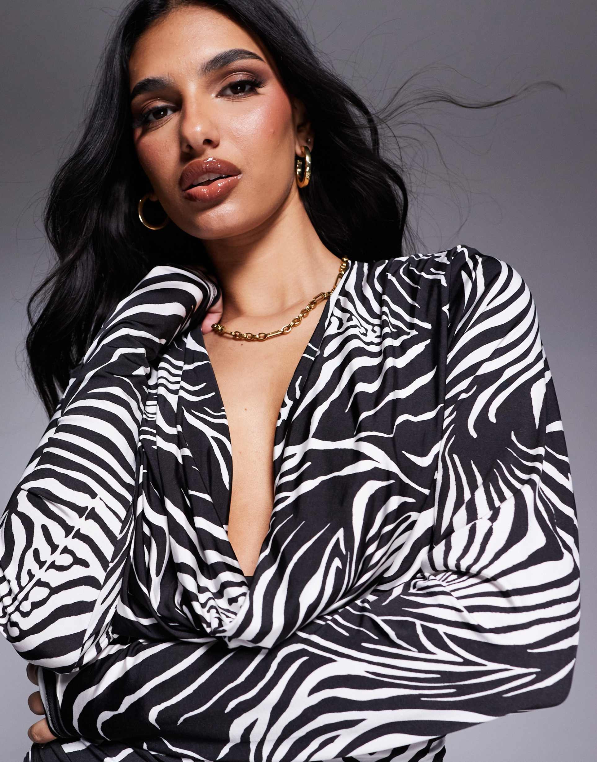 afrm kaia cowl neck mini dress in shiny knit in zebra swirl