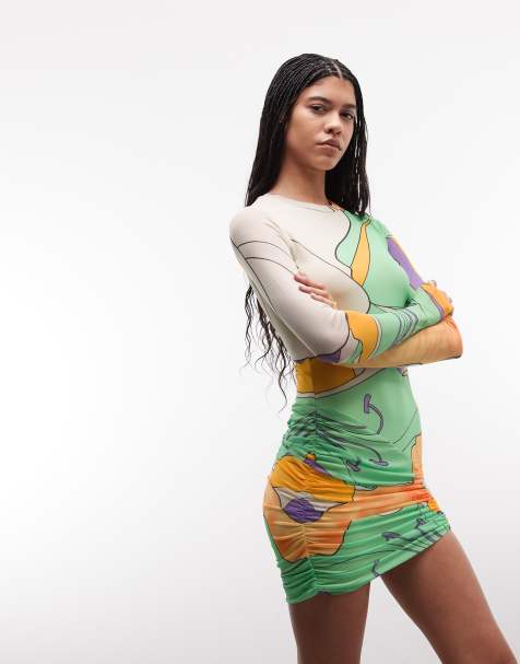 AFRM – Mirza – Zielona sukienka mini z długimi rękawami i marszczoną spódnicą w kwiatowy wzór - view 1