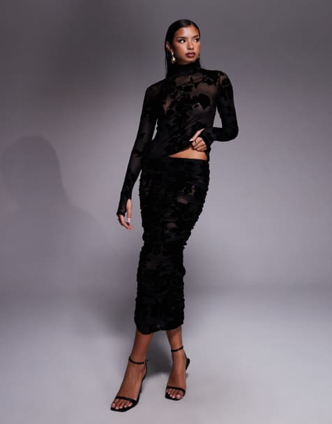 AFRM – Svart set med flockat, blommigt mönster, polotröja och midaxikjol - view 1