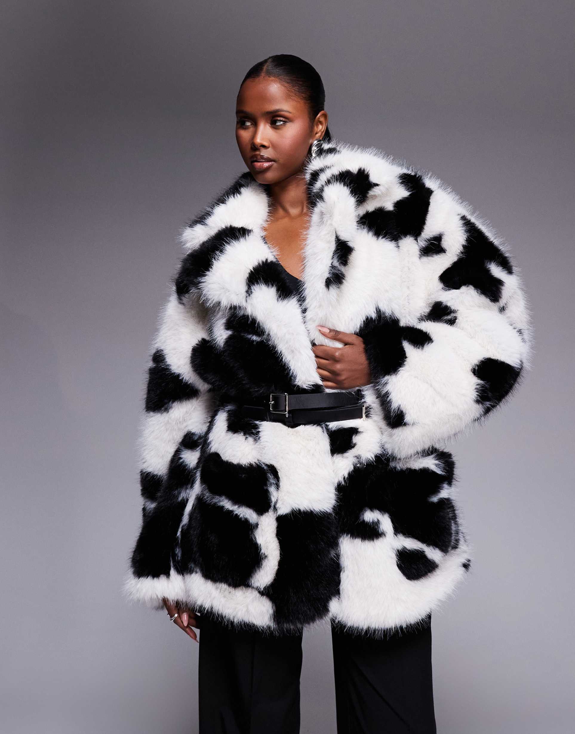 afrm teddy faux fur coat with wrap around faux leather belt in cow print