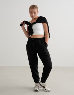 Aim'n - Bequeme Hose aus Modal in Schwarz mit Knöpfen