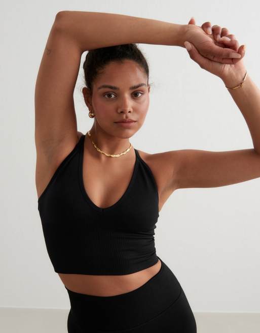 Aim'n - Naadloze shape bralette met gekruiste achterkant in zwart