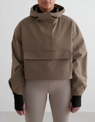 Aim'n Nougat cropped waterprood anorak in tan - view 1