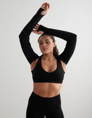 Aim'n - Shape Seamless - Nahtloser, langärmliger Bolero in Schwarz