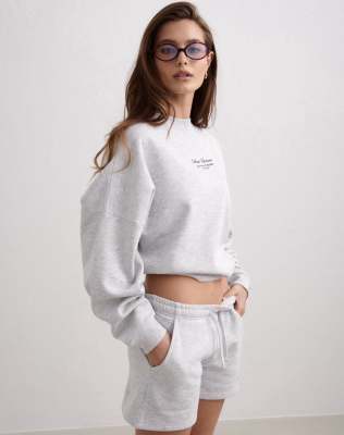 Sweatshirt in meliertem Hellgrau mit Schriftzug Grau 36