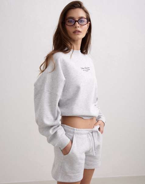 Aim'n – Sweatshirt in meliertem Hellgrau mit Schriftzug - view 1