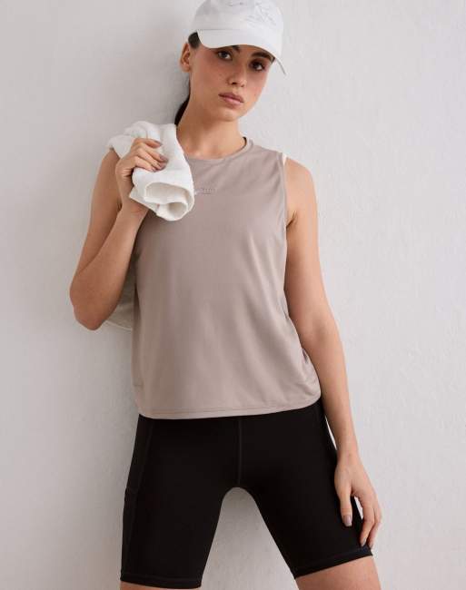 Aim'n - Top color arcilla oscuro para correr sin costuras