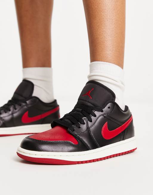 Air Jordan 1 low sneakers in black and gym red