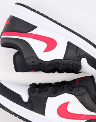 air jordan 1 low trainers in black and red