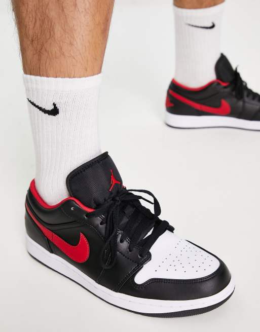 Air Jordan 1 Low trainers in black/fire red | ASOS