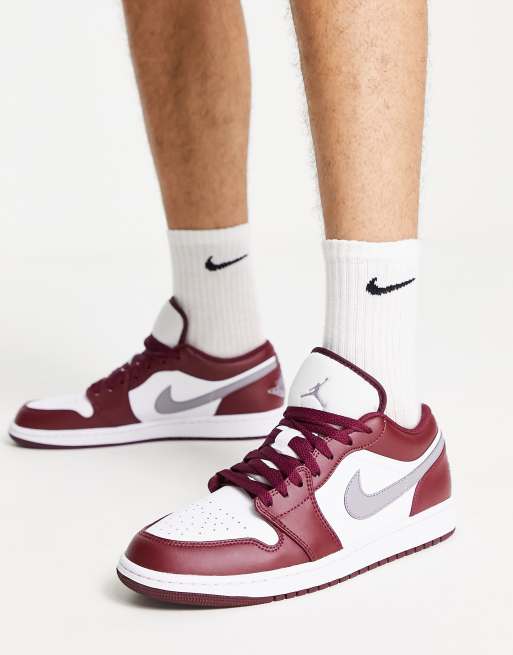 Air Jordan 1 Low trainers in cherrywood red/cement grey