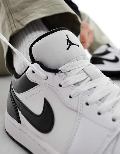 Air Jordan 1 low trainers in white and black