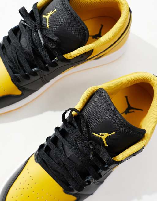 Air Jordan 1 low trainers in yellow and black