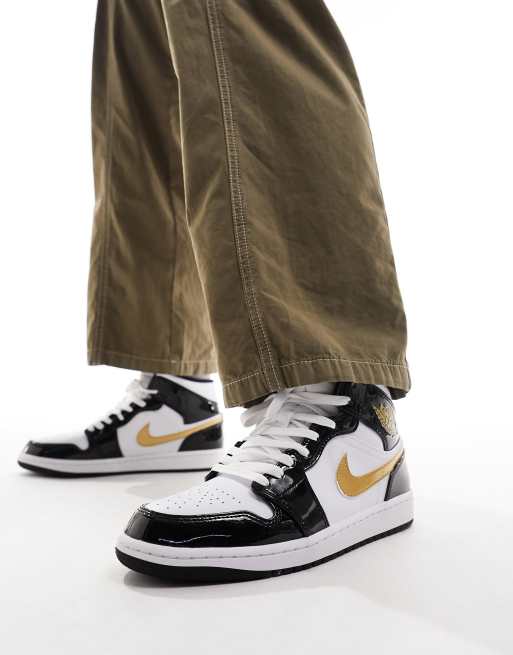 Black white and gold hotsell jordan 1