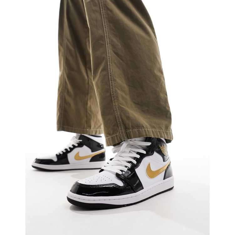 Jordan 1 shop nere e oro