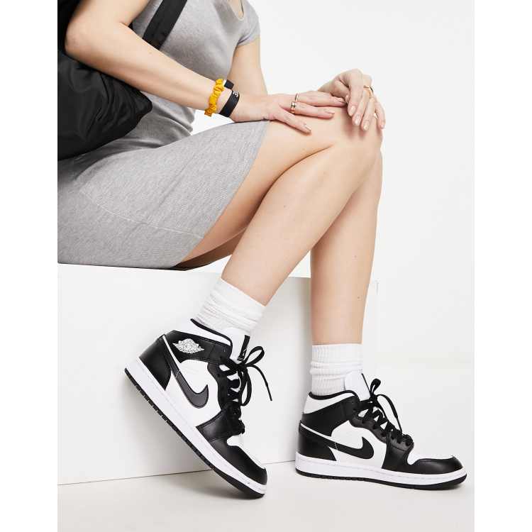 Air Jordan 1 Mid sneakers in white and black