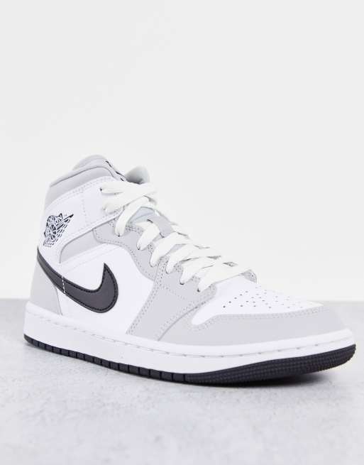 Grijze air jordan discount 1