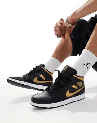 Air Jordan 1 mid trainers in black and gold | ASOS