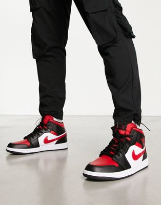 black and red jordan trainers