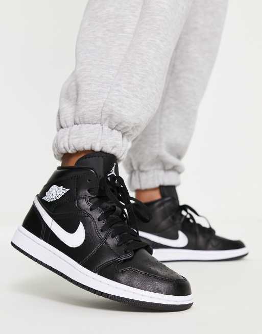 Air Jordan 1 Mid trainers in black | ASOS