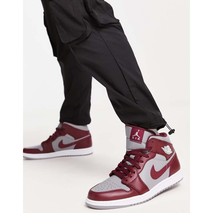 Air Jordan 1 Mid trainers in cherrywood red/cement grey | ASOS