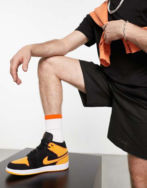 Air jordan 1 on sale mid black orange