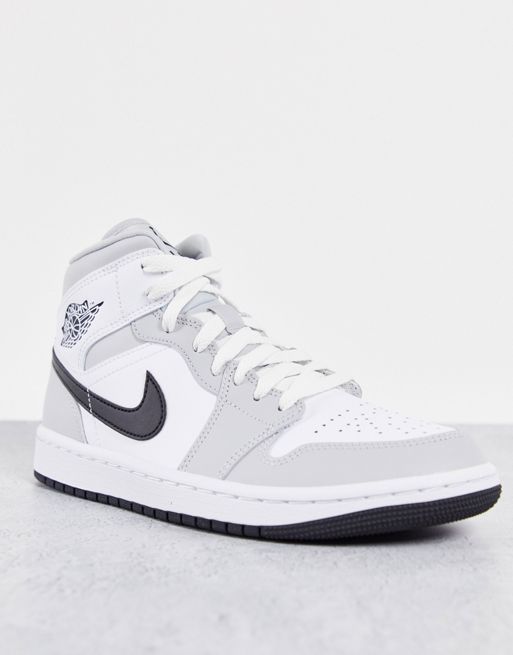 Air Jordan 1 Mid trainers in white and grey fog