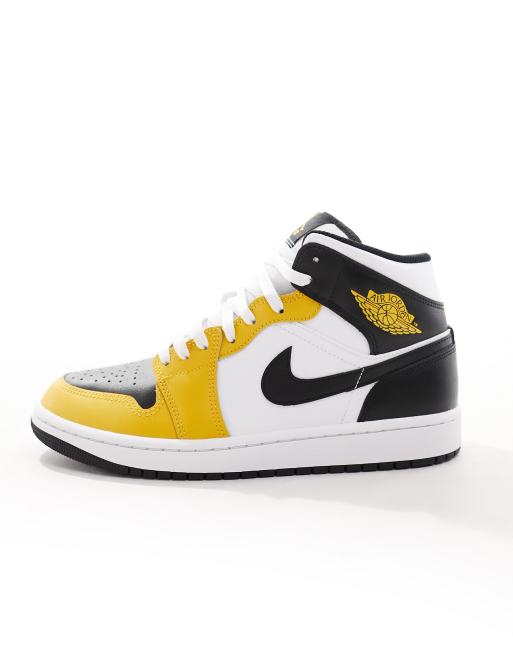 Air Jordan 1 Mid trainers in white and yellow ASOS