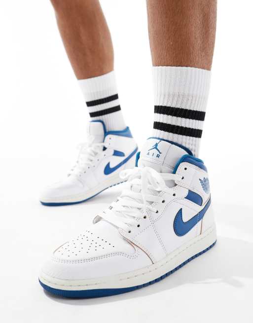 Air Jordan – 1 Mid – Vita och blå sneakers med halvhögt skaft