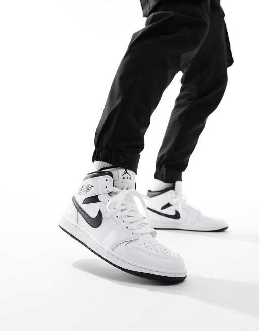 Black in white jordans on sale