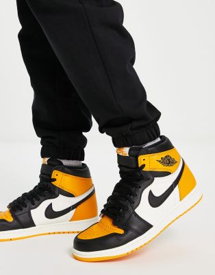 Air Jordan 1 Retro High OG in yellow taxi and black