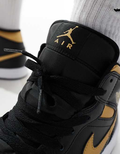 Air Jordan 1 Sneaker in Schwarz und Gold mit mittelhohem Schaft ASOS