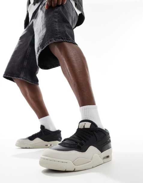 Air Jordan - 4 Remastered - Sneakers in zwart en wit - view 1