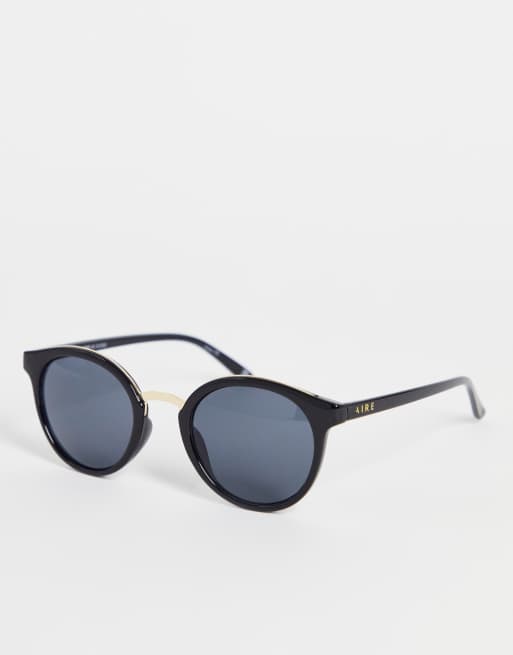 Dark black round store sunglasses