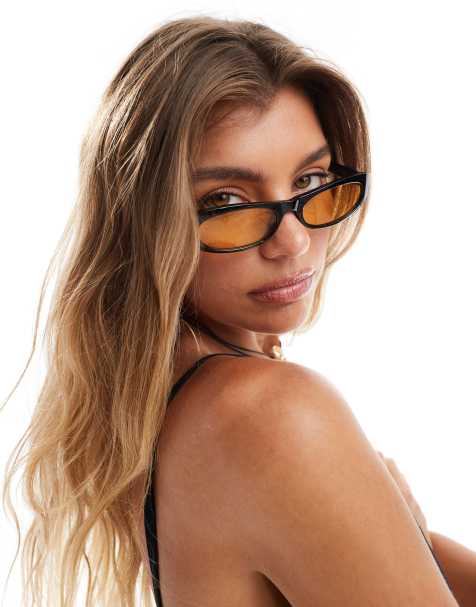 Aire Avior slim oval sunglasses in black with amber tint lens - view 1