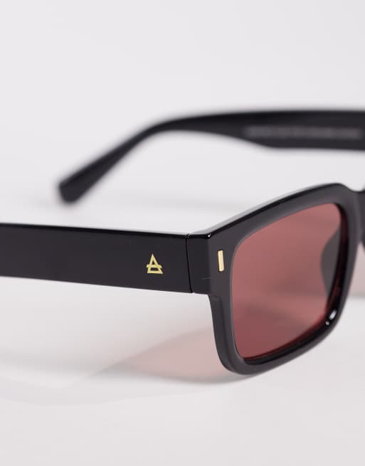 AIRE castor rectangular sunglasses in black with pink tinted lens, 2 of 3