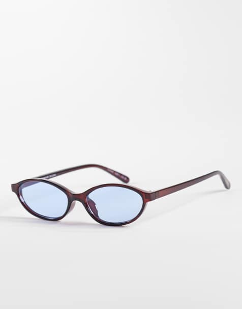 AIRE earthshine slim oval sunglasses in chestnut brown with blue tinted lens - view 1