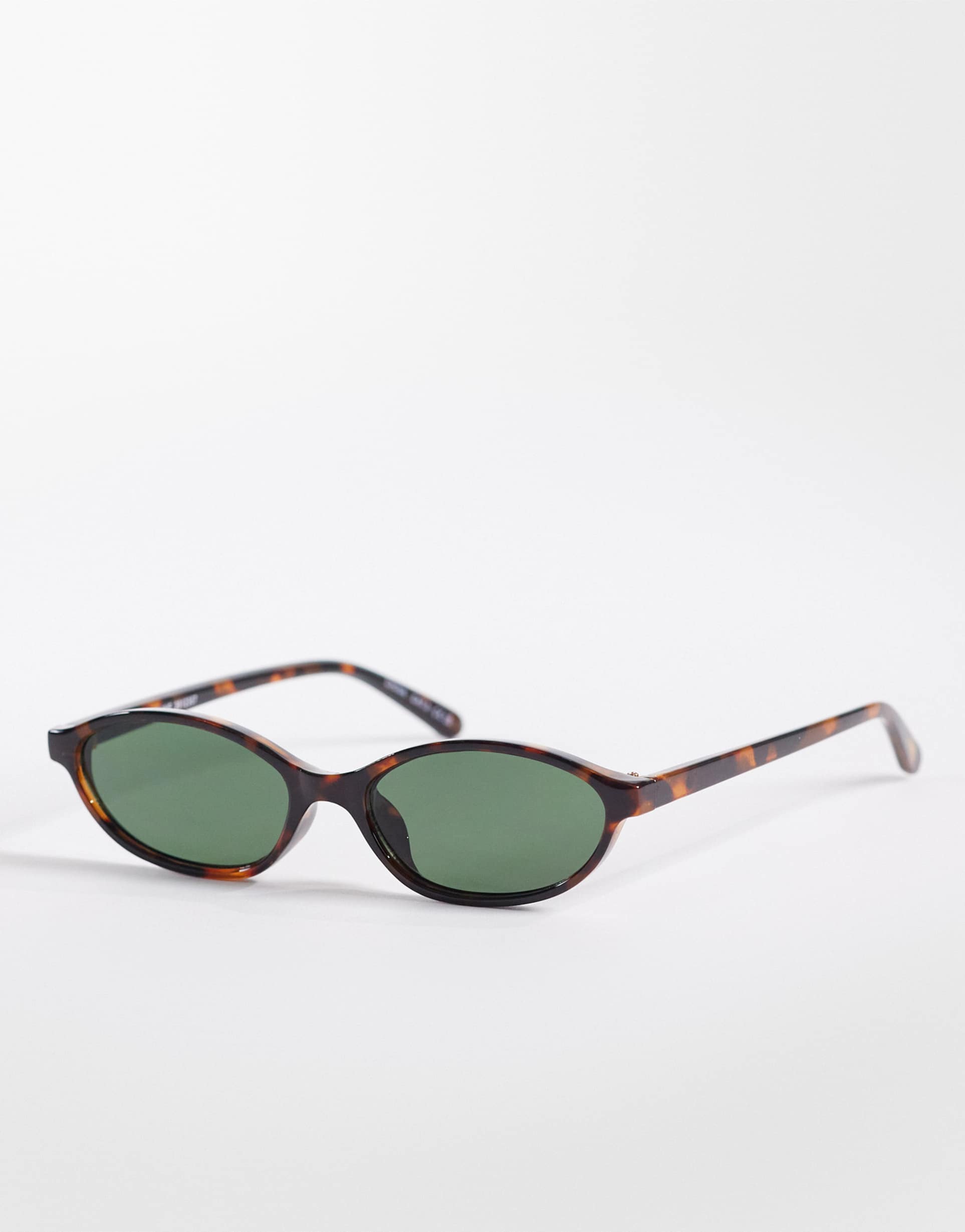 aire earthshine slim oval sunglasses in tortoiseshell with green lens