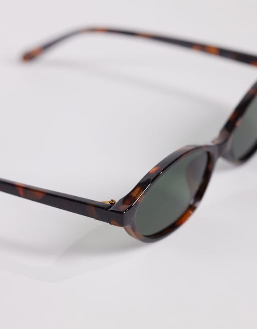 AIRE earthshine slim oval sunglasses in tortoiseshell with green lens, 2 of 3