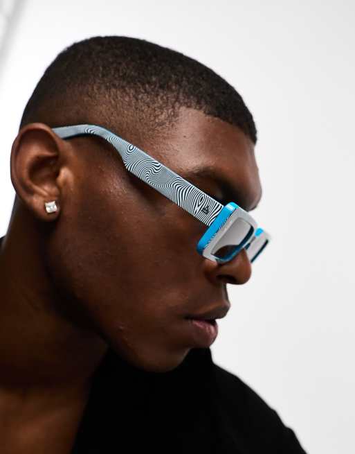 Gafas de sol azules y blancas rectangulares con estampado animal para  festivales Aire octans